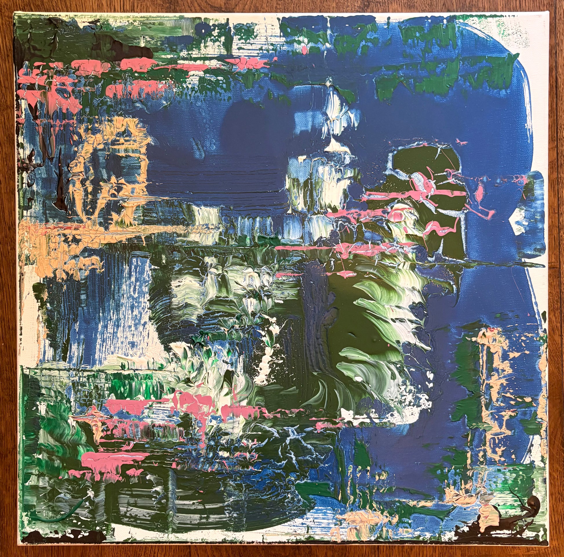 A study in shifting shoreline and changing light, this painting hovers between map and memory. Layers of indigo, olive and soft coral suggest tidal landscapes viewed from above, where water, marsh and sand continually redraw their boundaries. Thick passages of oil sit alongside scraped-back surfaces, allowing earlier colours to remain visible beneath the final composition.