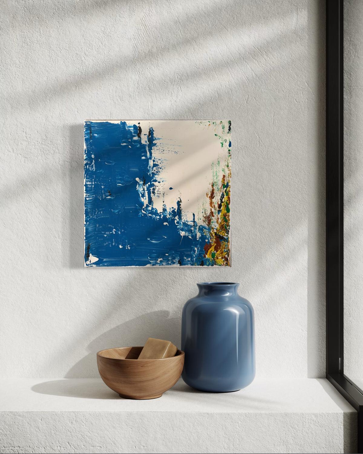 Inspired by the quiet geometry of harbour walls and weathered timber groynes, Harbour Edge explores the meeting point between land and sea through layered blues, open space and timeworn textures. The painting is less concerned with depicting a place than capturing its atmosphere—allowing memory, light and the imagination to complete the scene.