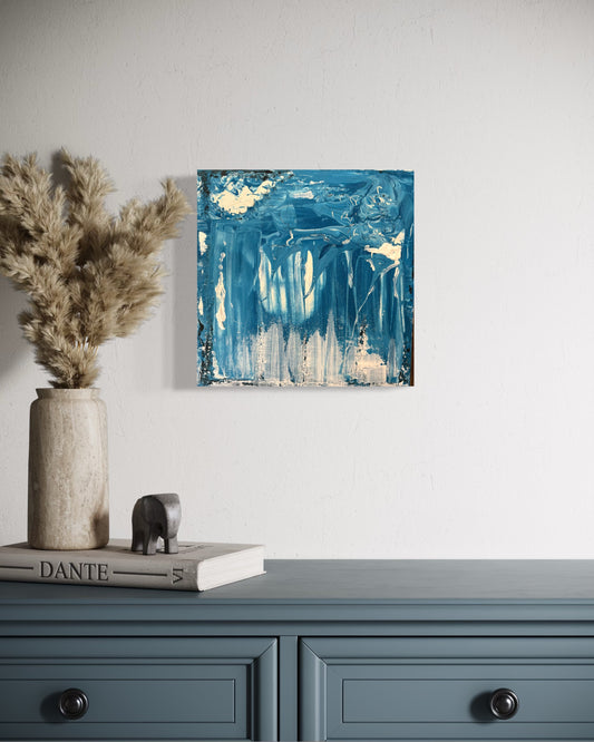 Inspired by the immense stillness of ice shelves and the hidden depths beneath open water, Soundings explores what lies below the surface. Layers of blue are scraped, poured and suspended, allowing light to filter through translucent passages before disappearing into darker depths. Rich in texture yet quiet in mood, the painting invites contemplation rather than certainty, leaving space for each viewer to discover their own landscape within it.