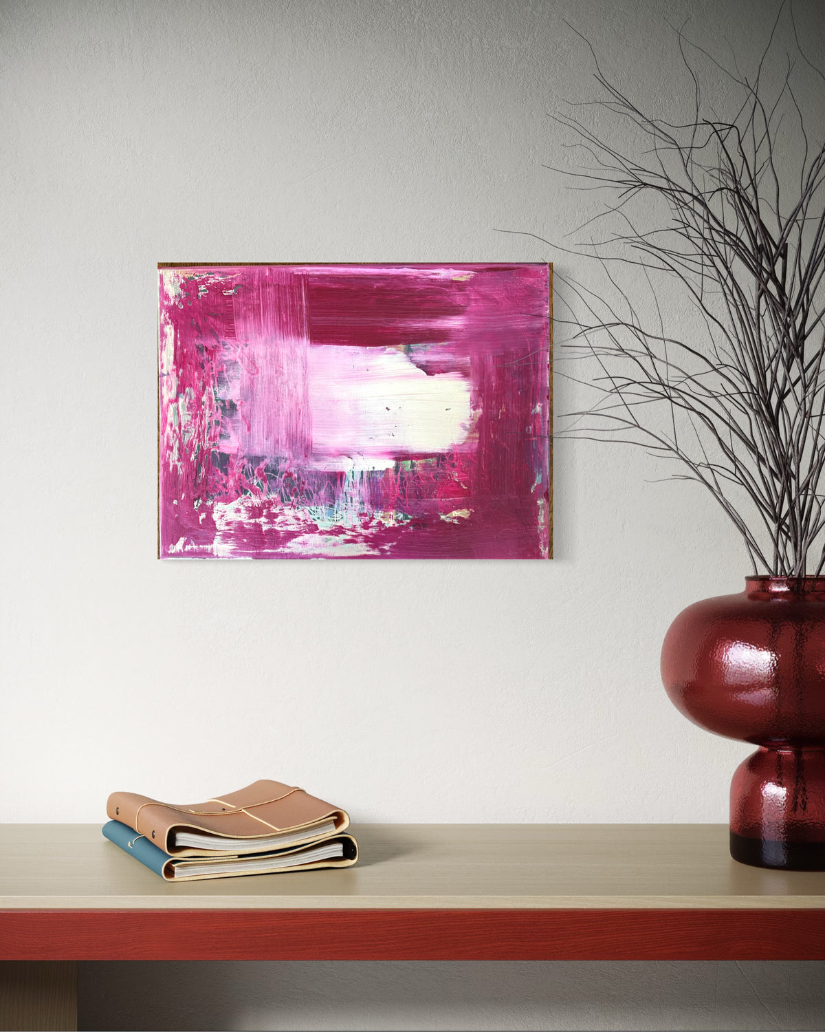 Still Becoming explores the beauty of what is left behind. Layers of rich magenta are brushed, scraped and partially obscured, allowing fragments of earlier marks to remain visible beneath the surface. The central field of light creates a quiet pause within the composition, balancing energy with stillness. Rather than concealing its history, the painting embraces it—each layer becoming part of the final work, much like the worn walls and lived-in interiors that continue to inspire my practice.