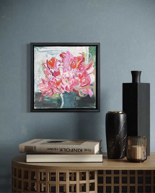 Unruly Blooms isn't interested in perfect arrangements. Built through instinctive brushstrokes and bold colour, the flowers twist, overlap and spill from the vase in a composition that feels both energetic and effortless. Hints of recognisable petals dissolve into abstraction, leaving space for the viewer to complete the story. It's a celebration of colour, movement and the quiet beauty found in things that refuse to stay neatly contained.

Oil on Canvas 30 x 30